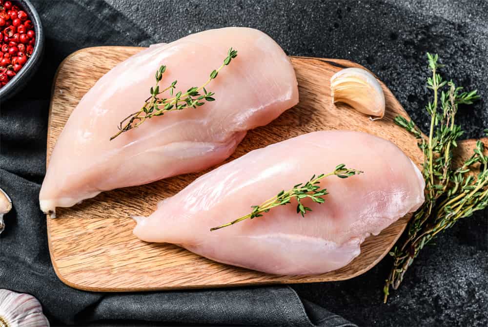 Why are Chicken Breasts with Ribs Cheaper than Boneless?